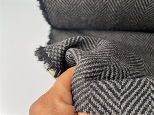 Vævet uld - smuk sildebensvævning i sort og gråbrun